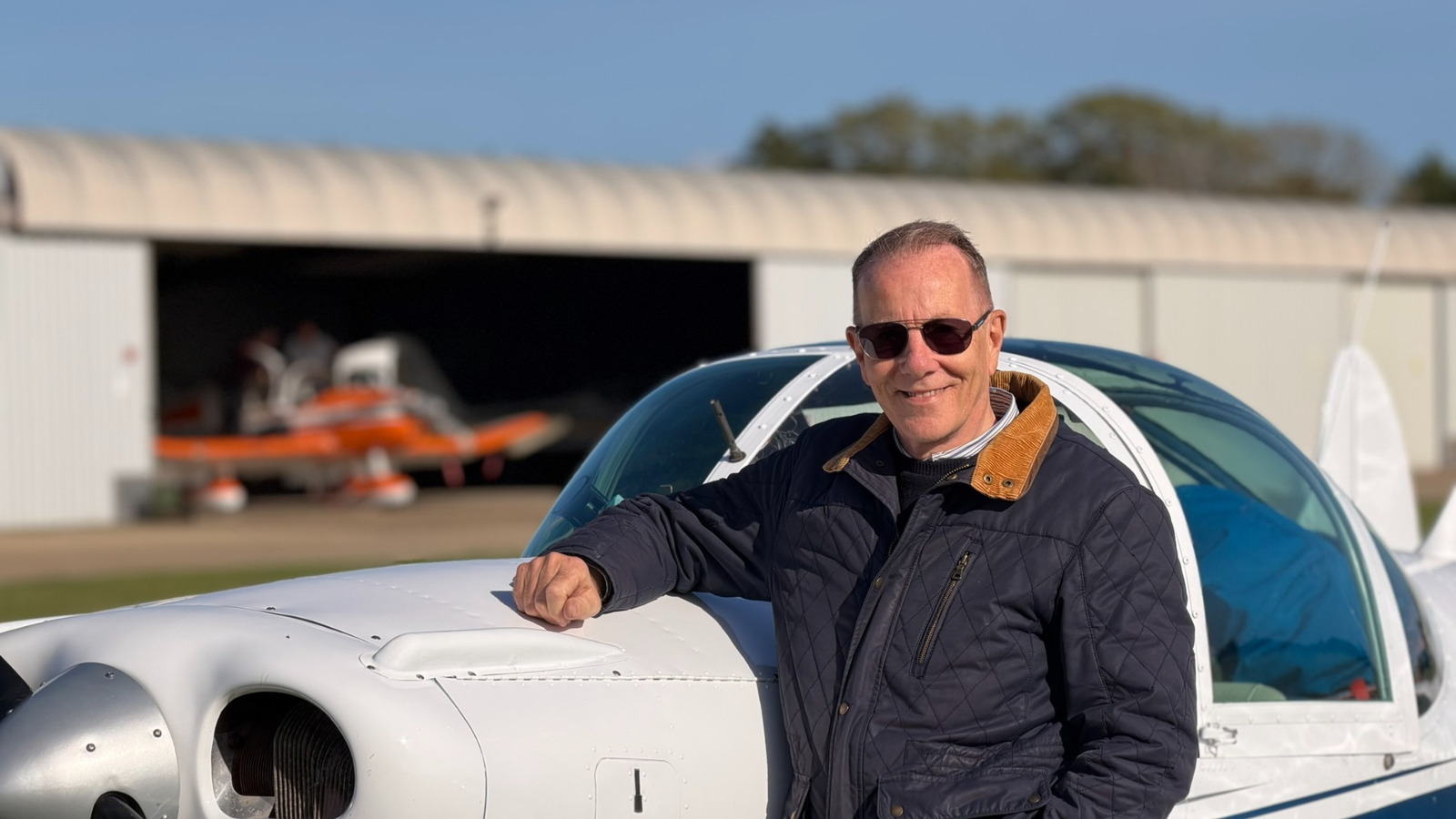Jonathan Grose beside his two-seat Aircoupe aircraft